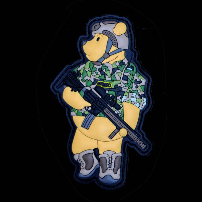 Winnie the Pew patch against black background